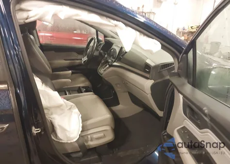 2019 Honda Odyssey Touring z USA, uszkodzony, nr VIN 5FNRL6H82KB027149